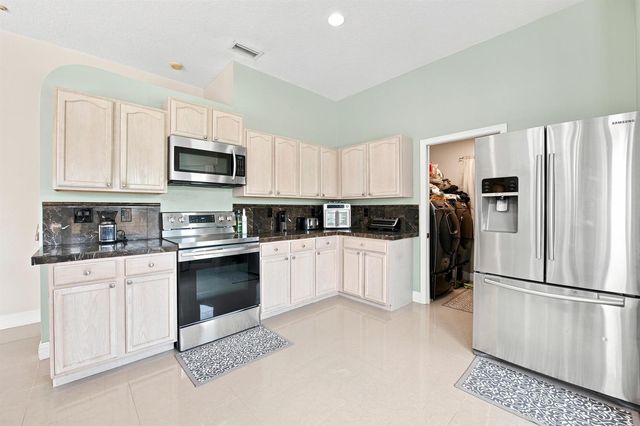 1526 SW MULLINAX Avenue, Port St. Lucie, FL 34953