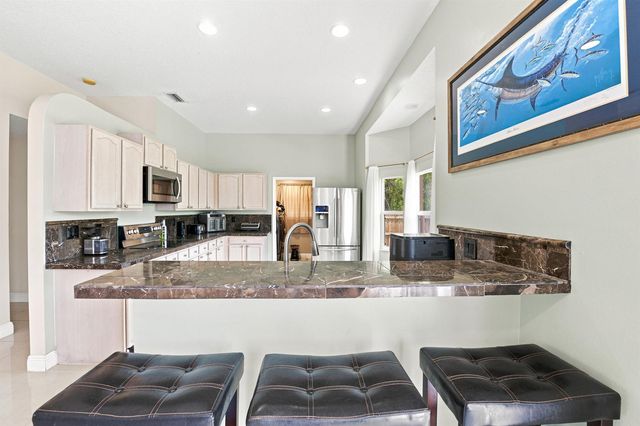 1526 SW MULLINAX Avenue, Port St. Lucie, FL 34953