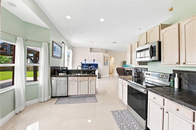 1526 SW MULLINAX Avenue, Port St. Lucie, FL 34953