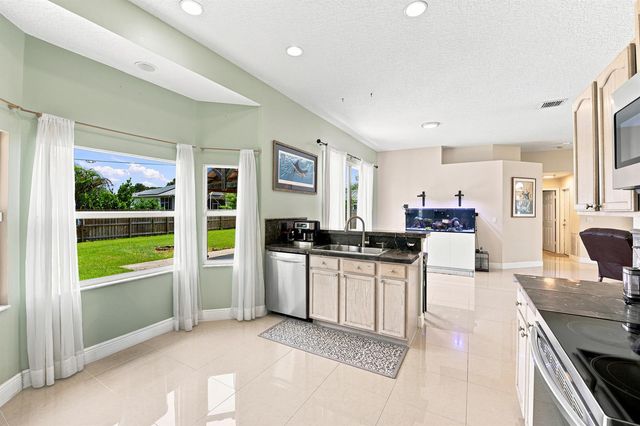 1526 SW MULLINAX Avenue, Port St. Lucie, FL 34953