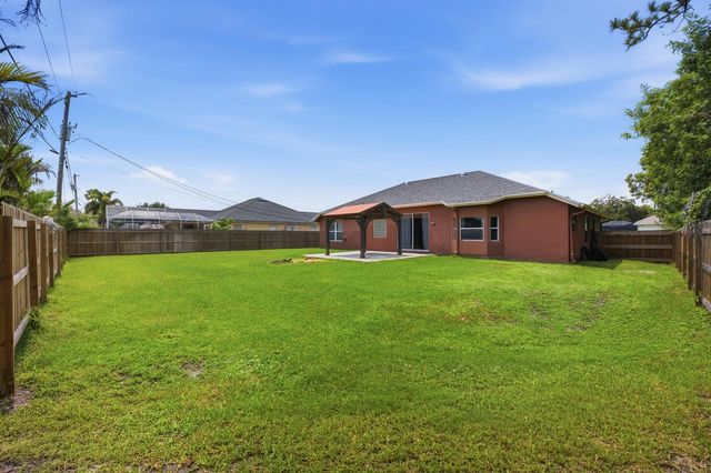 1526 SW MULLINAX Avenue, Port St. Lucie, FL 34953