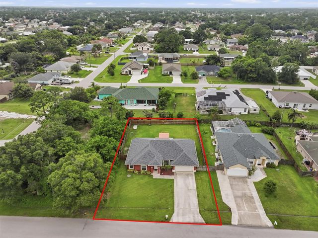 1526 SW MULLINAX Avenue, Port St. Lucie, FL 34953