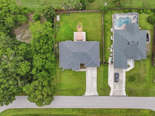 1526 SW MULLINAX Avenue, Port St. Lucie, FL 34953
