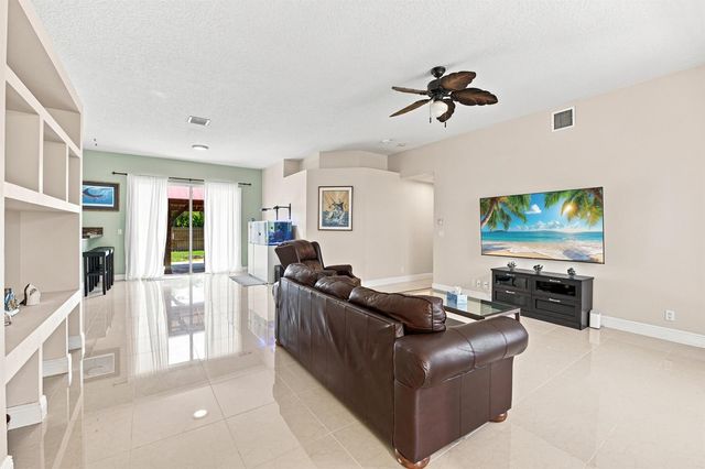 1526 SW MULLINAX Avenue, Port St. Lucie, FL 34953