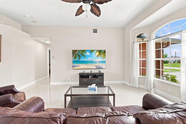 1526 SW MULLINAX Avenue, Port St. Lucie, FL 34953