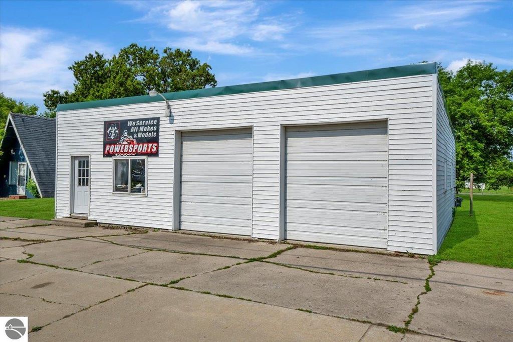 Image 1 of property listing at 100 & 102 S Bullock Street, Whittemore, MI 48770