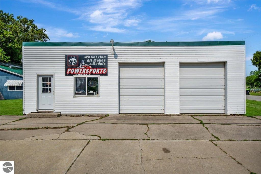 Image 3 of property listing at 100 & 102 S Bullock Street, Whittemore, MI 48770