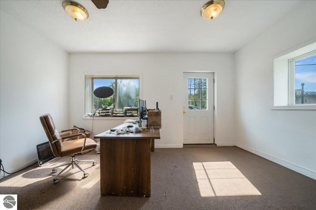 Image 6 of property listing at 100 & 102 S Bullock Street, Whittemore, MI 48770