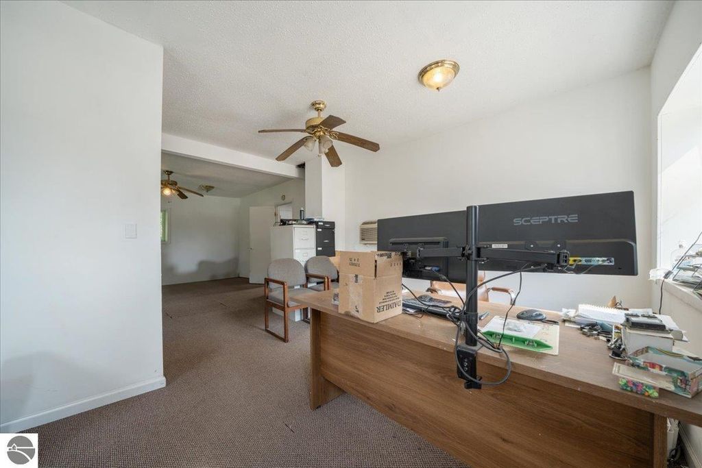 Image 7 of property listing at 100 & 102 S Bullock Street, Whittemore, MI 48770