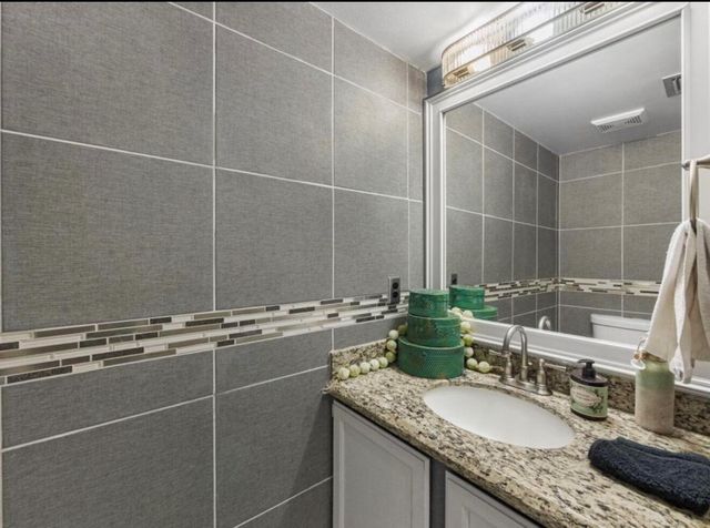 126 Hammocks Court, Greenacres, FL 33413