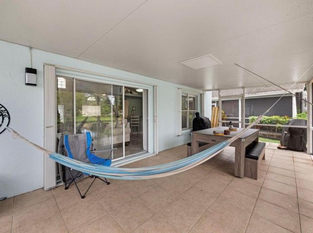 126 Hammocks Court, Greenacres, FL 33413