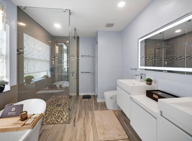 126 Hammocks Court, Greenacres, FL 33413