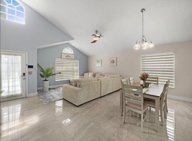 126 Hammocks Court, Greenacres, FL 33413