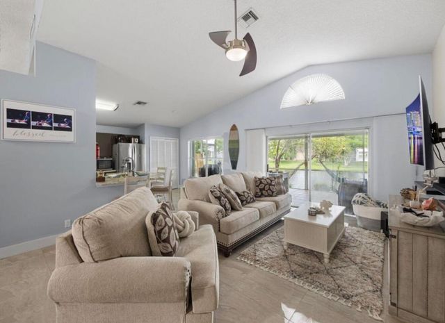 126 Hammocks Court, Greenacres, FL 33413