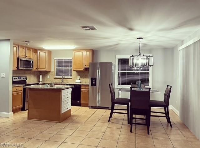 4921 Teak Wood DR, Naples, FL 34119