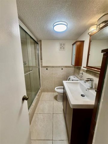 6190 Woodlands Boulevard 107, Tamarac, FL 33319