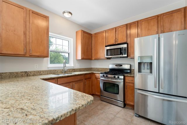 6108 Heron Hills Drive 56, Wolverine Lake Village, MI 48390