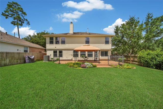 28634 Hidden Cove Drive, Magnolia, TX 77354