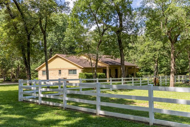 802 Sentinel Oaks, Pinehurst, TX 77362