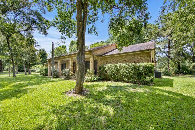 802 Sentinel Oaks, Pinehurst, TX 77362