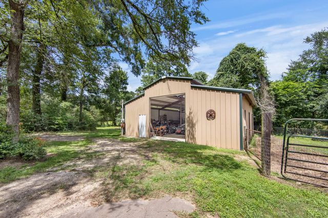 802 Sentinel Oaks, Pinehurst, TX 77362