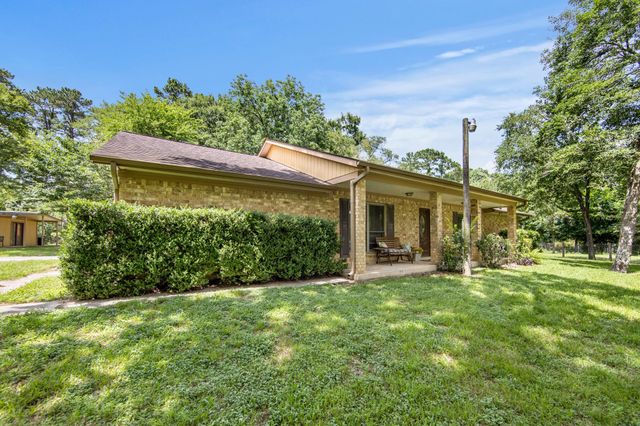 802 Sentinel Oaks, Pinehurst, TX 77362