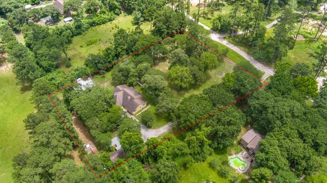 802 Sentinel Oaks, Pinehurst, TX 77362