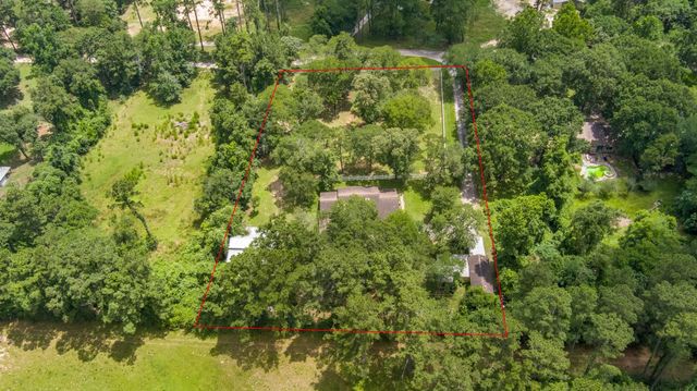 802 Sentinel Oaks, Pinehurst, TX 77362