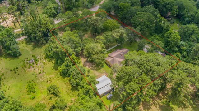 802 Sentinel Oaks, Pinehurst, TX 77362