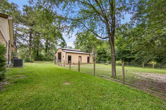 802 Sentinel Oaks, Pinehurst, TX 77362