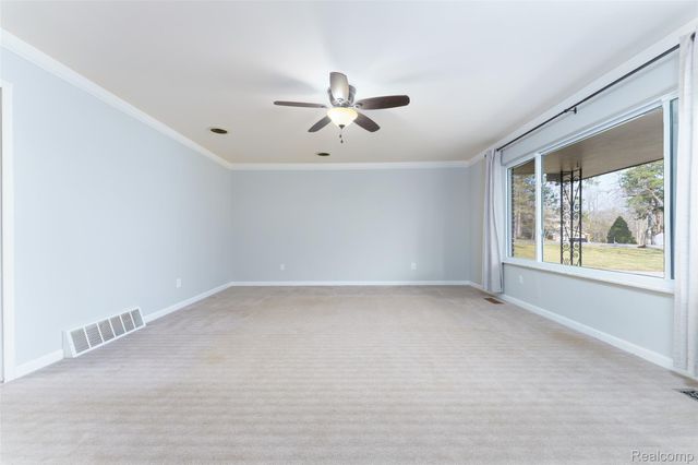 1243 Blue Heron Drive, Highland Charter Township, MI 48357