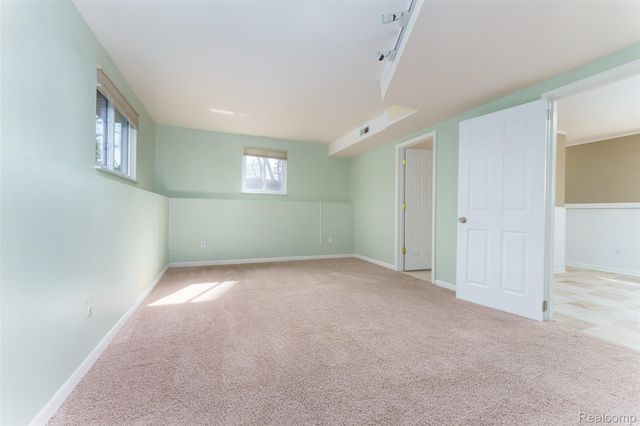 1243 Blue Heron Drive, Highland Charter Township, MI 48357