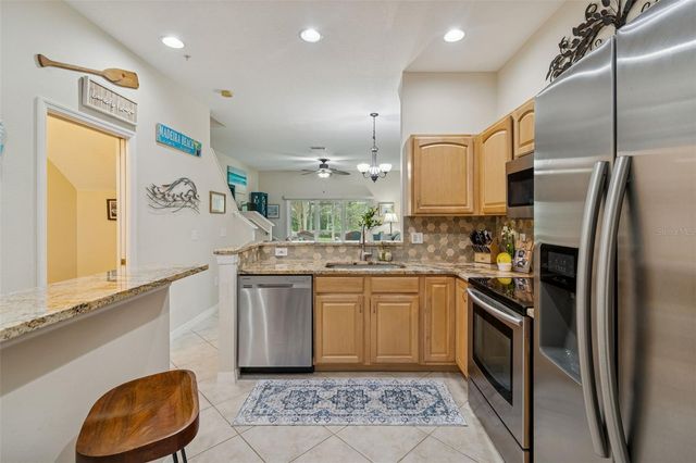 11133 KAPOK GRAND CIRCLE, Madeira Beach, FL 33708