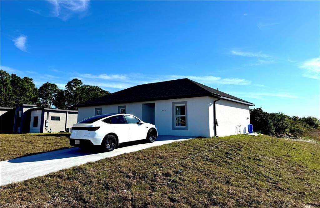 3015 4th ST SW, LEHIGH ACRES, FL 33976 — exterior