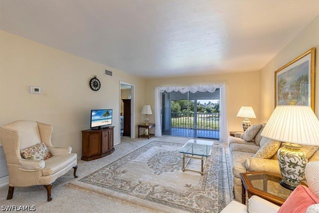 5483 Rattlesnake Hamm RD B-201, Naples, FL 34113