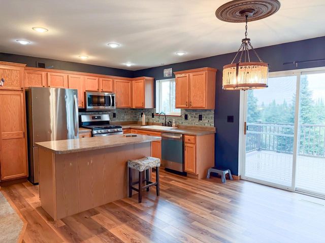 1407 DELMORE DRIVE, Merrill, WI 54452