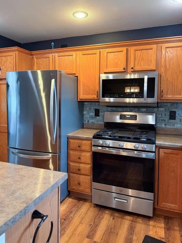 1407 DELMORE DRIVE, Merrill, WI 54452
