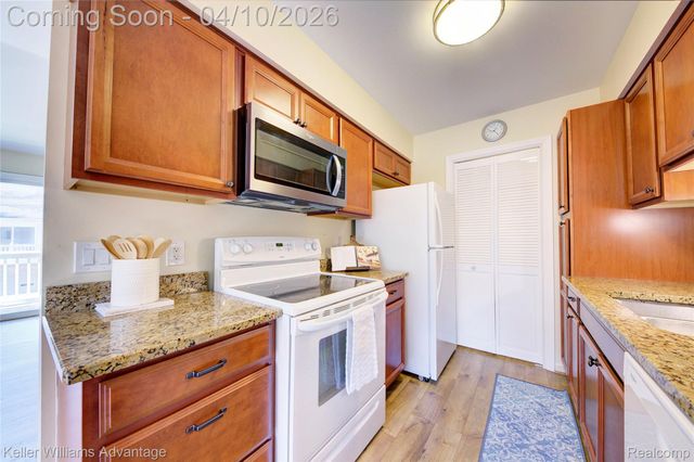 2038 Hidden Meadows Drive D, Walled Lake, MI 48390
