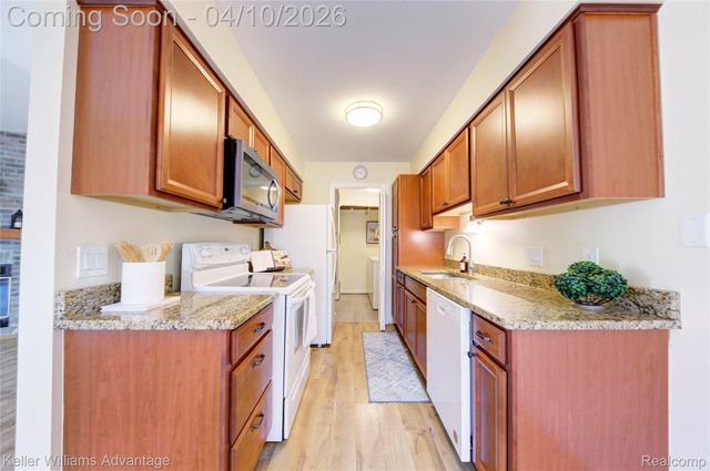 2038 Hidden Meadows Drive D, Walled Lake, MI 48390