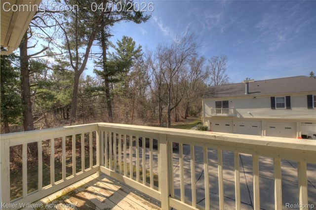 2038 Hidden Meadows Drive D, Walled Lake, MI 48390