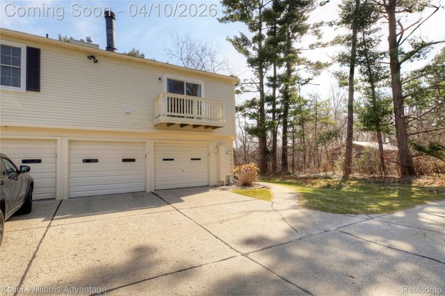 2038 Hidden Meadows Drive D, Walled Lake, MI 48390