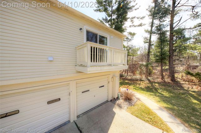 2038 Hidden Meadows Drive D, Walled Lake, MI 48390