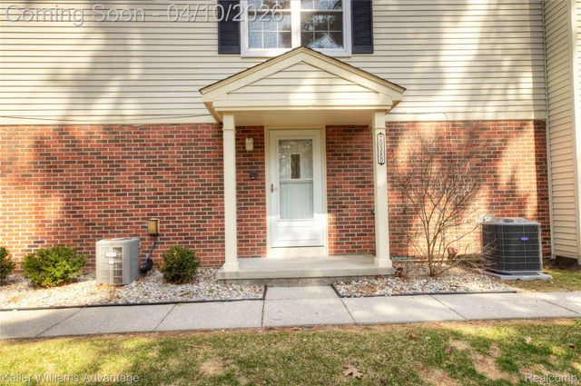 2038 Hidden Meadows Drive D, Walled Lake, MI 48390