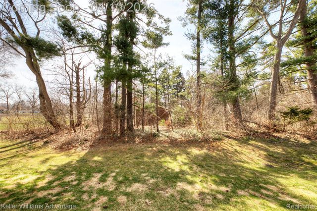 2038 Hidden Meadows Drive D, Walled Lake, MI 48390