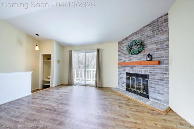2038 Hidden Meadows Drive D, Walled Lake, MI 48390