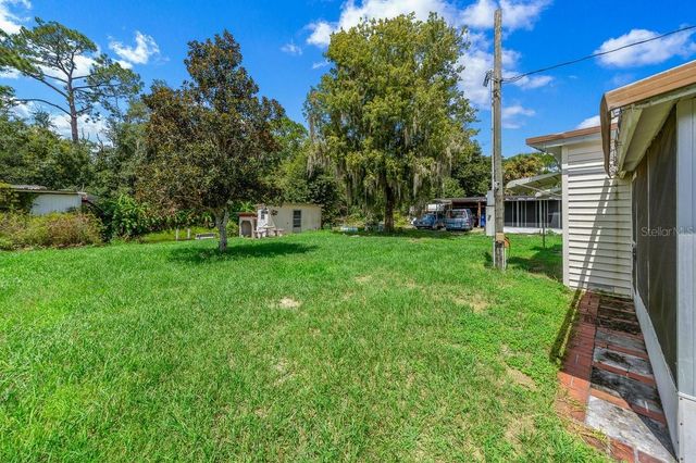 13337 WOODLAND DRIVE, Astatula, FL 34705