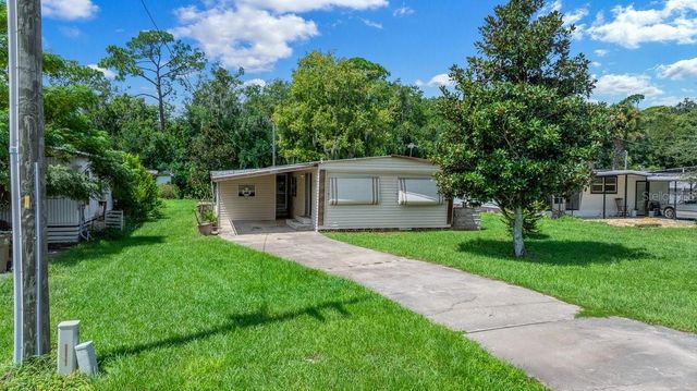 13337 WOODLAND DRIVE, Astatula, FL 34705