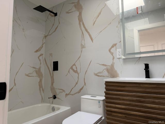 48-10 66th Street, Woodside, NY 11377