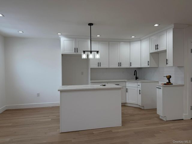 48-10 66th Street, Woodside, NY 11377