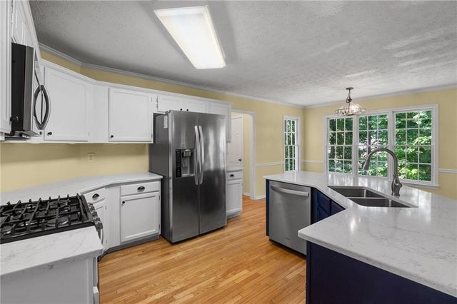 4848 Helga NE Way, Woodstock, GA 30188